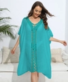 Detail of the turquoise crochet lace V-neck and wavy texture on a loose beach cover-up - One Size / Green