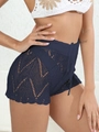 Dettaglio degli shorts da mare all'uncinetto blu navy con motivi e cordoncino - Blu Notte
