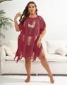 Detail of burgundy crochet beach cover-up with distressed cut-outs and tassel hem - One Size / Wine Red