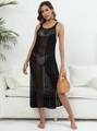 Detalle del vestido de playa de ganchillo negro con tejidos calados y aberturas laterales - Negro