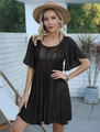 Detail of black beach cover-up featuring intricate crochet cut-out mesh and ruffle sleeves - One Size / Black