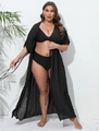Detail of black beach cover-up featuring intricate lace trim and lightweight chiffon fabric - One Size / Tops / Black