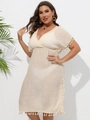 Detail of beige V-neck beach cover-up featuring tassel trim and textured fabric - 0XL / Apricot
