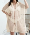 Detail view of cream mesh beach cover-up featuring shirt collar and button-down front - One Size / Apricot