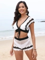 Close-up of crochet knit texture and black contrast stitching on white beachwear set - S / White