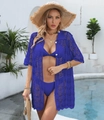 Detail of blue crochet knit beach cover-up with polo collar and white buttons - Blue
