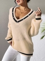 Detail of V-neck beige knit sweater with contrast stripes and elegant pearl embellishments - S / Tops / Apricot
