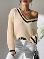 Women's V-neck knit sweater with cream color, black trim, and elegant pearl embellishments - S / Apricot