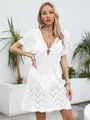 Close-up of white crochet beach dress featuring geometric hollow textures and V-neckline - S / White