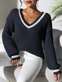 Close-up of V-neck knit sweater featuring white stripe trim and delicate pearl beads - S / Tops / Navy Blue