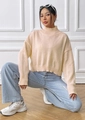 Detail of the high collar and soft knit texture on this cream-colored pullover sweater - S / Apricot