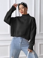 Detail of mock-neck knit sweater showing thick ribbed texture and oversized drop shoulder style - S / Black