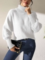 Detail of white turtleneck knit sweater featuring elegant lantern sleeves and ribbed cuffs - S / Tops / White