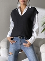Close-up of black V-neck knitted sweater vest styled over a white long sleeve shirt - Black