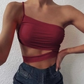 Detail of wine red slim fit top with one-shoulder strap and geometric waist cut-out - S / Burgundy