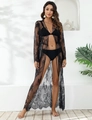 Dettaglio del copricostume lungo in pizzo nero con eleganti bordi floreali smerlati - S / Nero