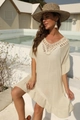 Dettaglio di pizzo all'uncinetto e orlo a balze su un vestito da spiaggia beige - Taglia unica / Top E Pantaloni / Albicocca
