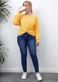 Detailed close-up of the front twist-knot detail and pleated texture on this yellow T-shirt - Yellow