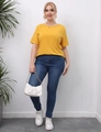 Plus size women's yellow cutout short sleeve T-shirt with denim jeans and white bag - 0XL/L / Yellow