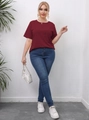 Detail of burgundy plus size T-shirt with hollow-out design shown on model - 0XL/L / Wine Red