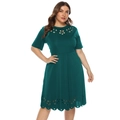 Detail of laser-cut hollow-out floral patterns on a dark green plus-size dress - Dark Green