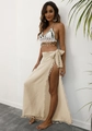 Detail of crochet bikini top with shells and beige fringed wrap skirt set - Apricot
