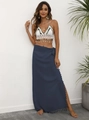Close-up of handmade crochet bikini top with seashell tassels and bohemian fringe detail - One Size / Bottoms / Navy Blue