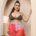 Detailed view of hand-crochet halter top with shell tassels and tie-dye flared pants - One Size / Army Green