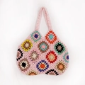 Detail of colorful crochet granny squares on a handmade pink cotton tote shoulder bag - Pink