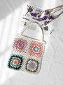 Close-up detail of crochet granny square bag with colorful knit patterns and woven texture - White / One Size