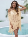 Close-up of light yellow crochet knit beach cover-up with fringe trim and hollow texture - One Size / Apricot