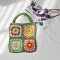 Detail of colorful granny square crochet tote bag with handmade bohemian patterns - Green / One Size