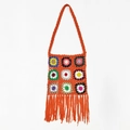 Colorful handmade crochet shoulder bag with floral patterns and vibrant long tassels - Orange