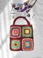 Detailed top view of a handmade granny square crochet tote bag with bohemian floral patterns - Wine Red / One Size