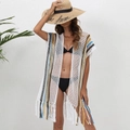 Detailed view of bohemian crochet beach cover-up with colorful stripes and fringe hem - One Size / Tops / White