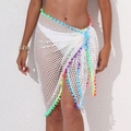Detail of white mesh sarong beach cover-up with colorful pom-pom fringe trim - One Size / Bottoms / White