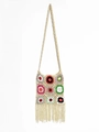 Detailed macro shot of bohemian crochet bag with colorful floral squares and long fringe - Apricot Tassel Woven Style / Apricot