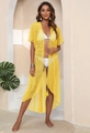 Dettaglio copricostume da spiaggia giallo all'uncinetto con ricami e nappe sul bordo - Taglia unica / Top / Giallo