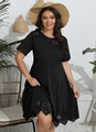 Detail of laser-cut floral embroidery on a black short sleeve plus size dress - Black