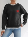 Women's black knit sweater with red heart embroidery and striped trim on white background - S / Black