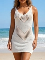 Dettaglio del vestito da spiaggia bianco lavorato all'uncinetto con trama a V traforata - S / Bianco