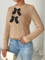Women's khaki cable-knit sweater with black bow accents and classic round neckline - S / Khaki