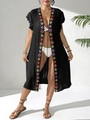 Detail of colorful geometric embroidery and textured fabric on black beach cardigan - One Size / Black