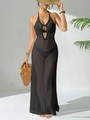 Detail of black hollow-out crochet beach dress showing knit texture and side slit - S / Tops / Black