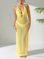 Detail of yellow crochet knit beach dress featuring a halter neck and hollow out pattern - Yellow