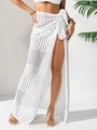 Detailed view of white crochet beach wrap skirt with intricate geometric hollow patterns - Bottoms / White