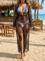Detailed macro view of delicate black lace fabric and floral embroidery on a beach cover-up - S / Tops / Black