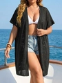 Close-up of black heart crochet pattern on a loose knit beach bikini cover-up cardigan - One Size / Black