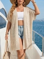 Close-up of heart pattern crochet knit texture on beige beach cover-up cardigan - One Size / Apricot
