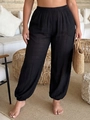 Detail view of high-waist elastic band and breathable fabric texture on black beach pants - 1XL / Black